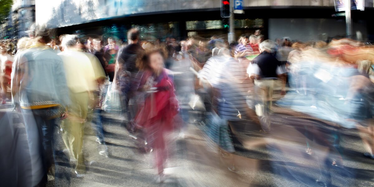 People in motion on a crowded city street