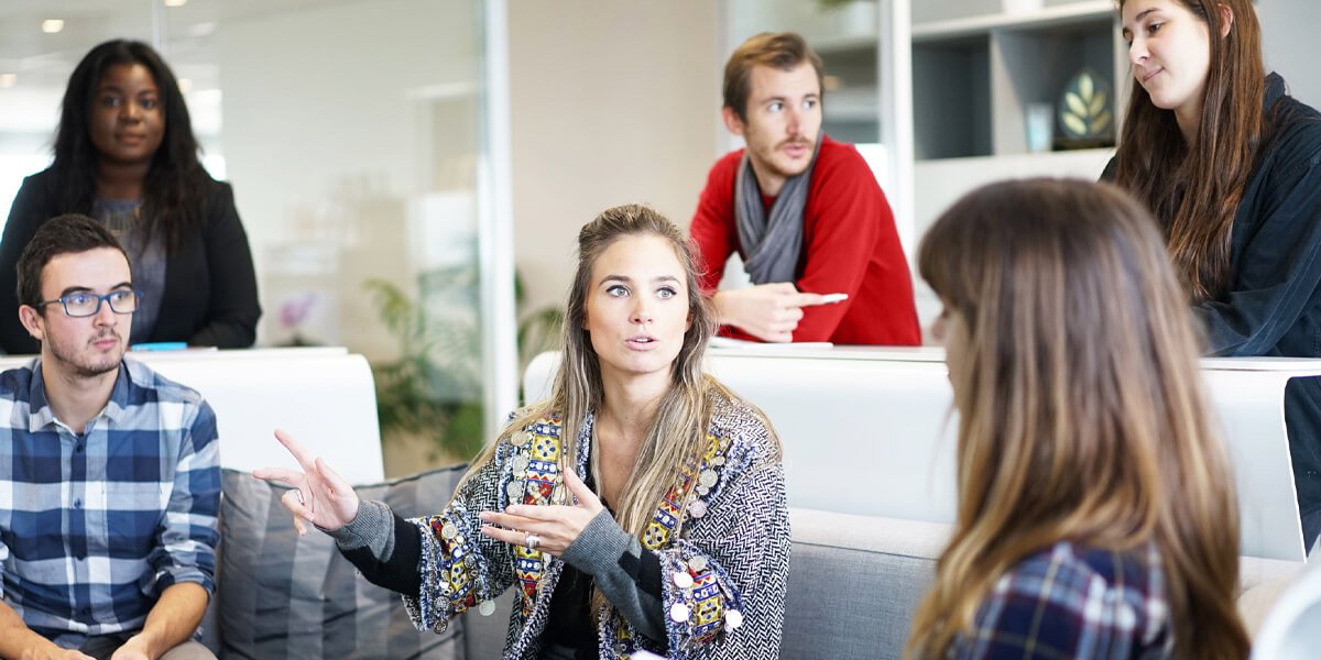 Multicultural group discussing at a table